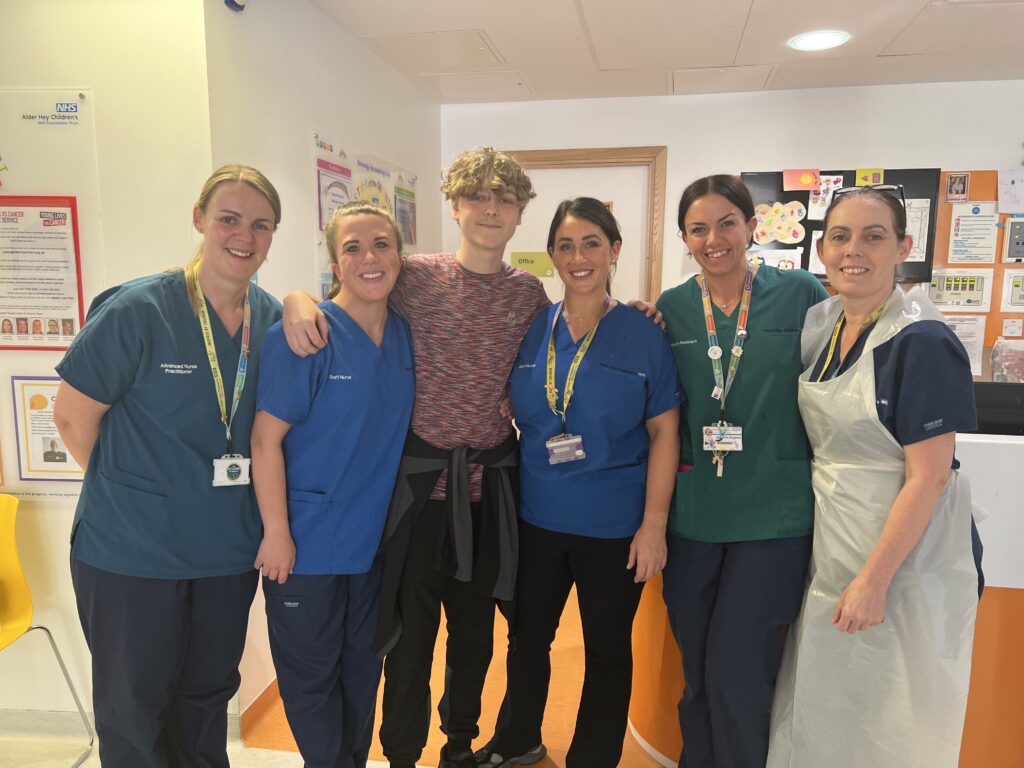 Callum with nurses at Alder Hey