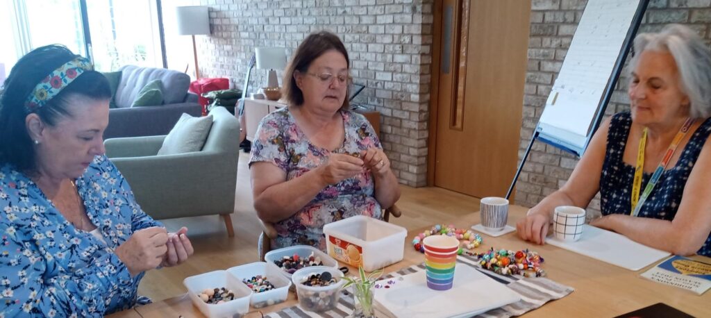 Alder Centre volunteers doing arts and crafts