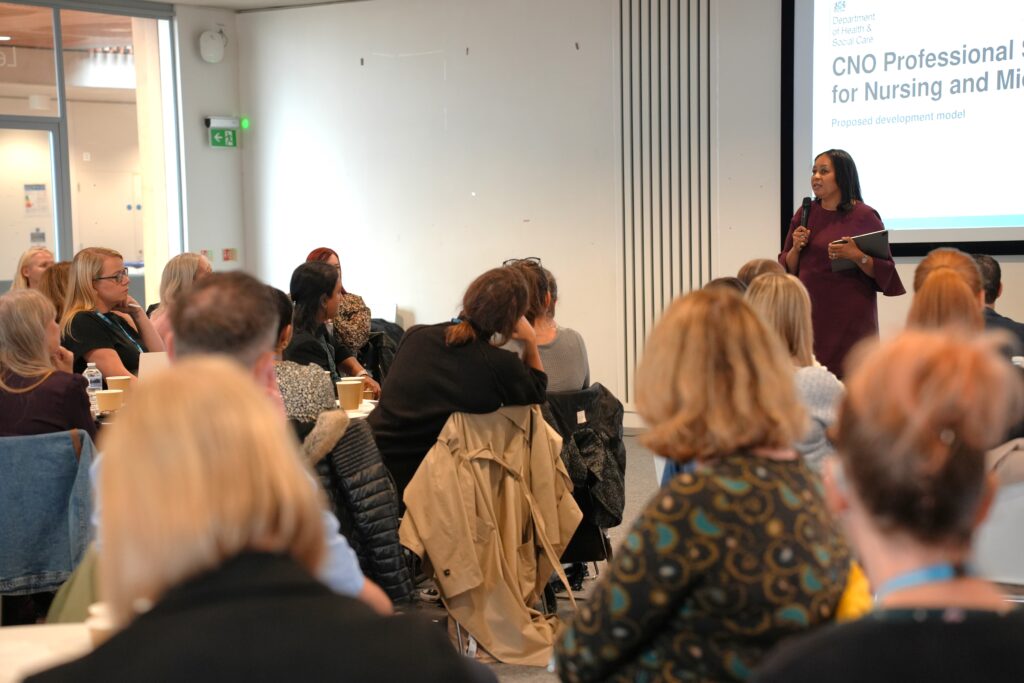 An image of Acosia Nyanin addressing the room during the event at Alder Hey.