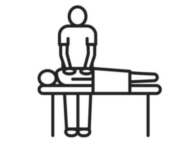 An image depicting someone laying on a bed receiving a massage.