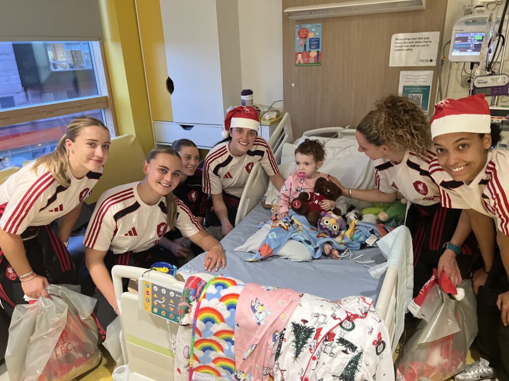 LFC Ladies players with an Alder Hey patient