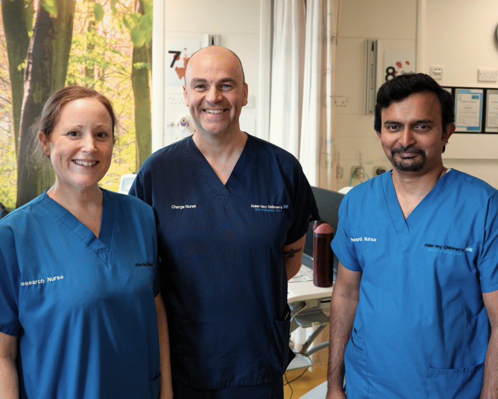 Image of Team Leader Tim Henderson (centre) with research nurse Nic Colebrook (left) and Shinoy Robinson (right)