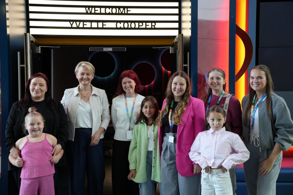Group image of Yvetter Cooper with Parent Champions outside MediCinema