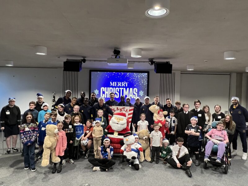 Everton first team squad and children at Alder Hey