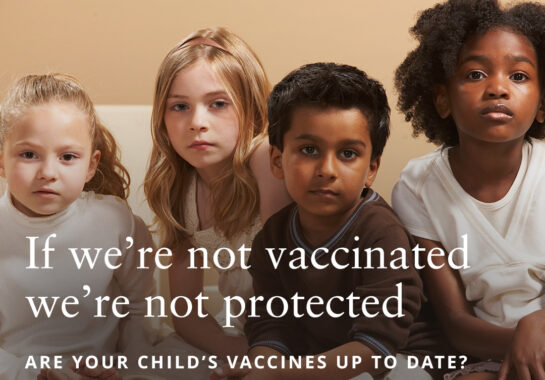 children posing for image about vaccines