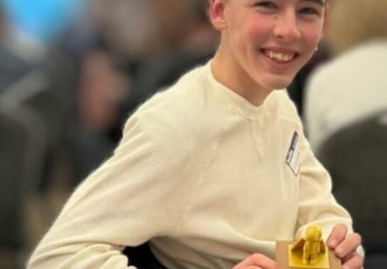 Lewis with his award