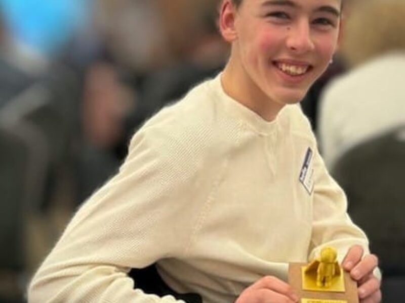 Lewis with his award