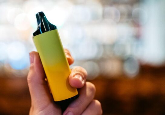 hand holding a vape
