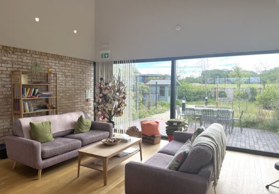 A photograph showcasing the interior of the Alder Centre