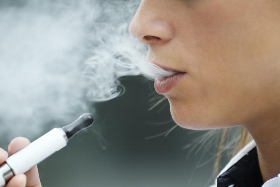 A person smoking a vape.