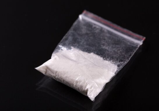An image of ketamine in powder form contained in a small bag.