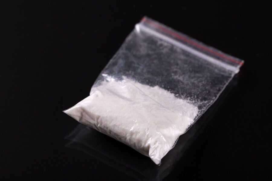 An image of ketamine in powder form contained in a small bag.