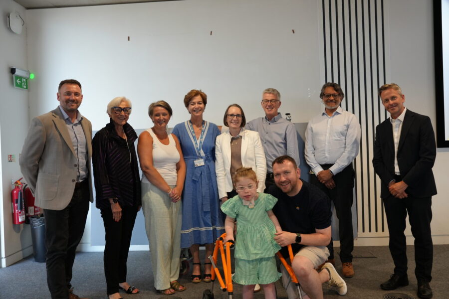 Representatives of Alder Hey, the Liverpool Neonatal Partnership and Morgan Sindall pose for a photo with Betty Batt and her family at Alder Hey.