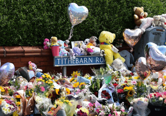 An image of the flowers and tributes left at Tithebarn Road following the Southport Incident in 2024.