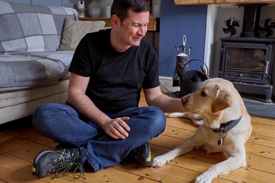 Nathan pictured with trainee guide dog