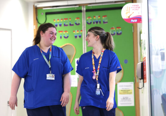 Two nurses walking