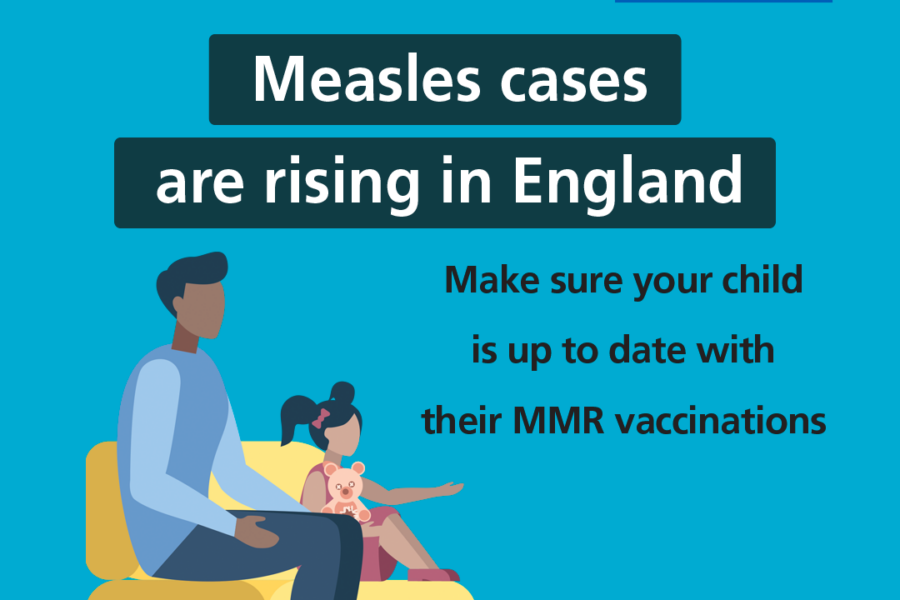 A cartoon father and daughter. Text reads "Measles cases are rising in England - make sure your child is up to date with their vaccinations"