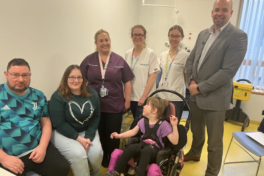 Hayley and family with some of the team who treated her at Alder Hey
