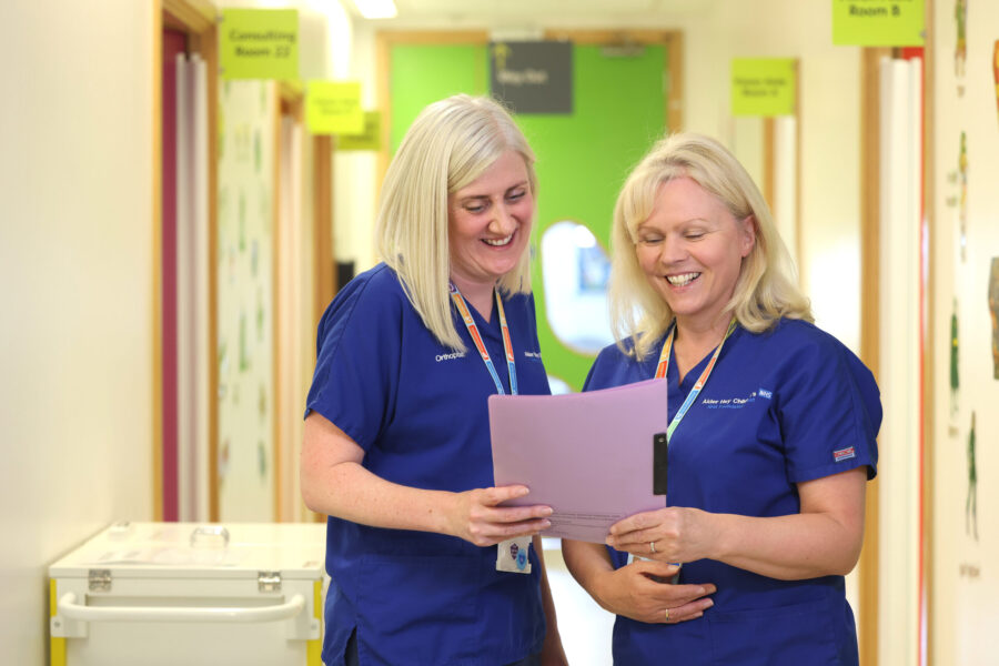 Two nurses talking