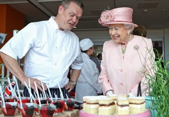 Queen and chef with tea party