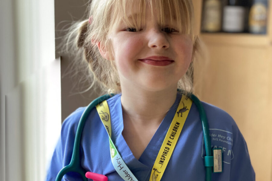 Child in surgeons uniform